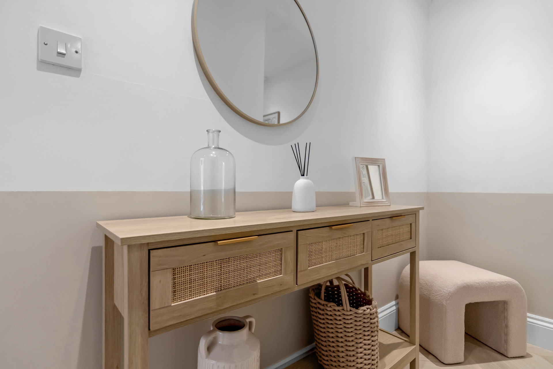 Beautifully staged property hallway and console table